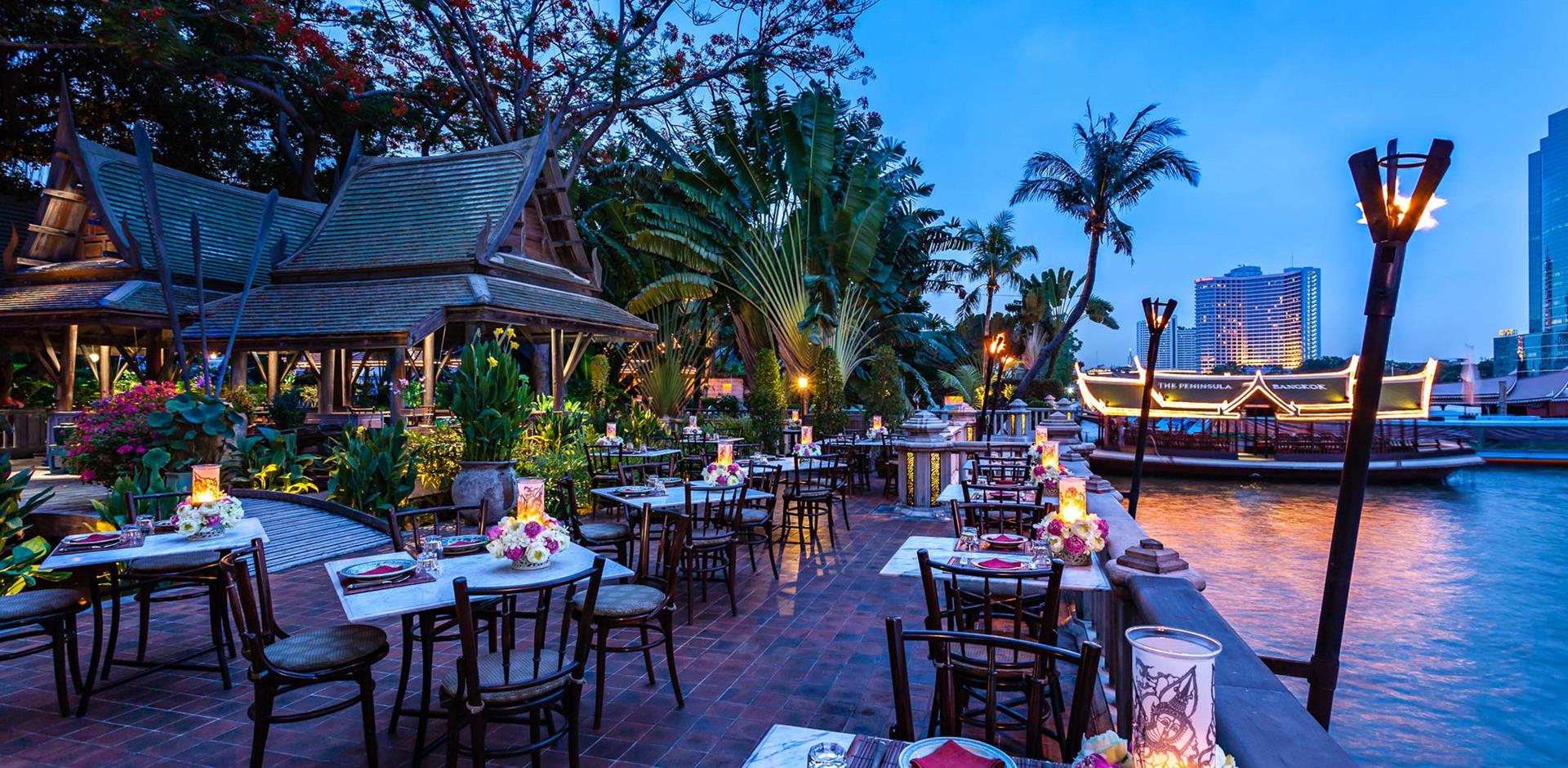 Outdoor dining area, The Peninsula Bangkok, Thailand