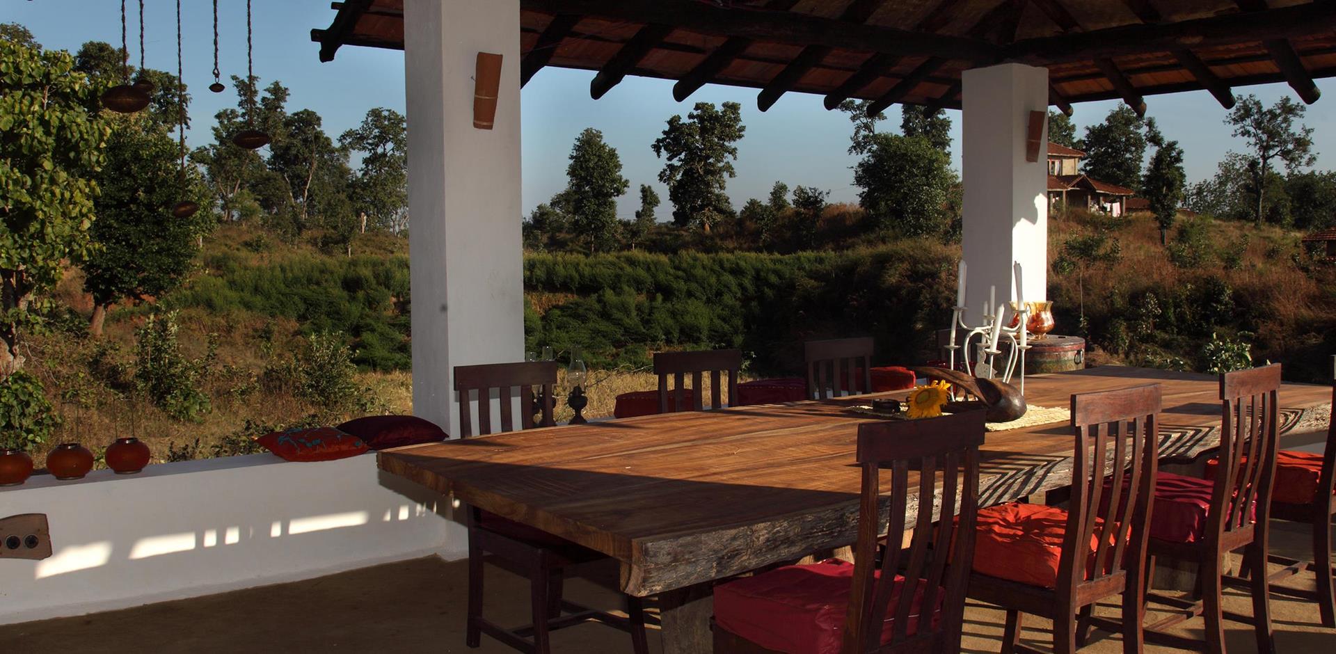 Outdoor dining, Flame of the Forest Safari Lodge, Kanha National Park, India